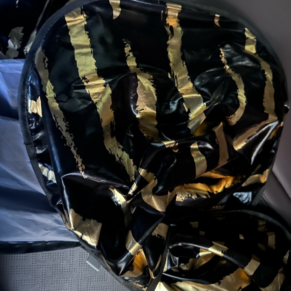 Gold and black window sunshade 3/15